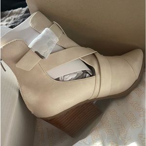 Brand New in Box. Bone white ankle booties from Yellow Box, size 10 Back Zip.